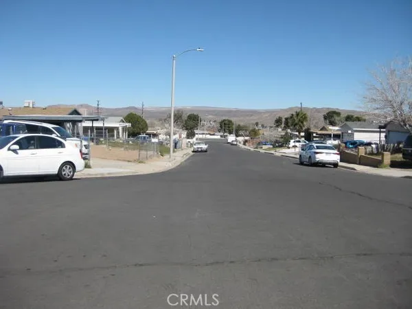 a view of city street with cars