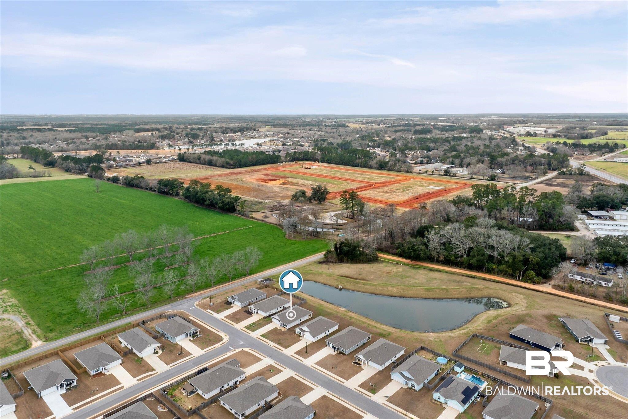 17041 Muse Street Loxley, AL 36551 - Photo 37 of 44 Aerial overview of property's location with a nearby body of water and nearby suburban area