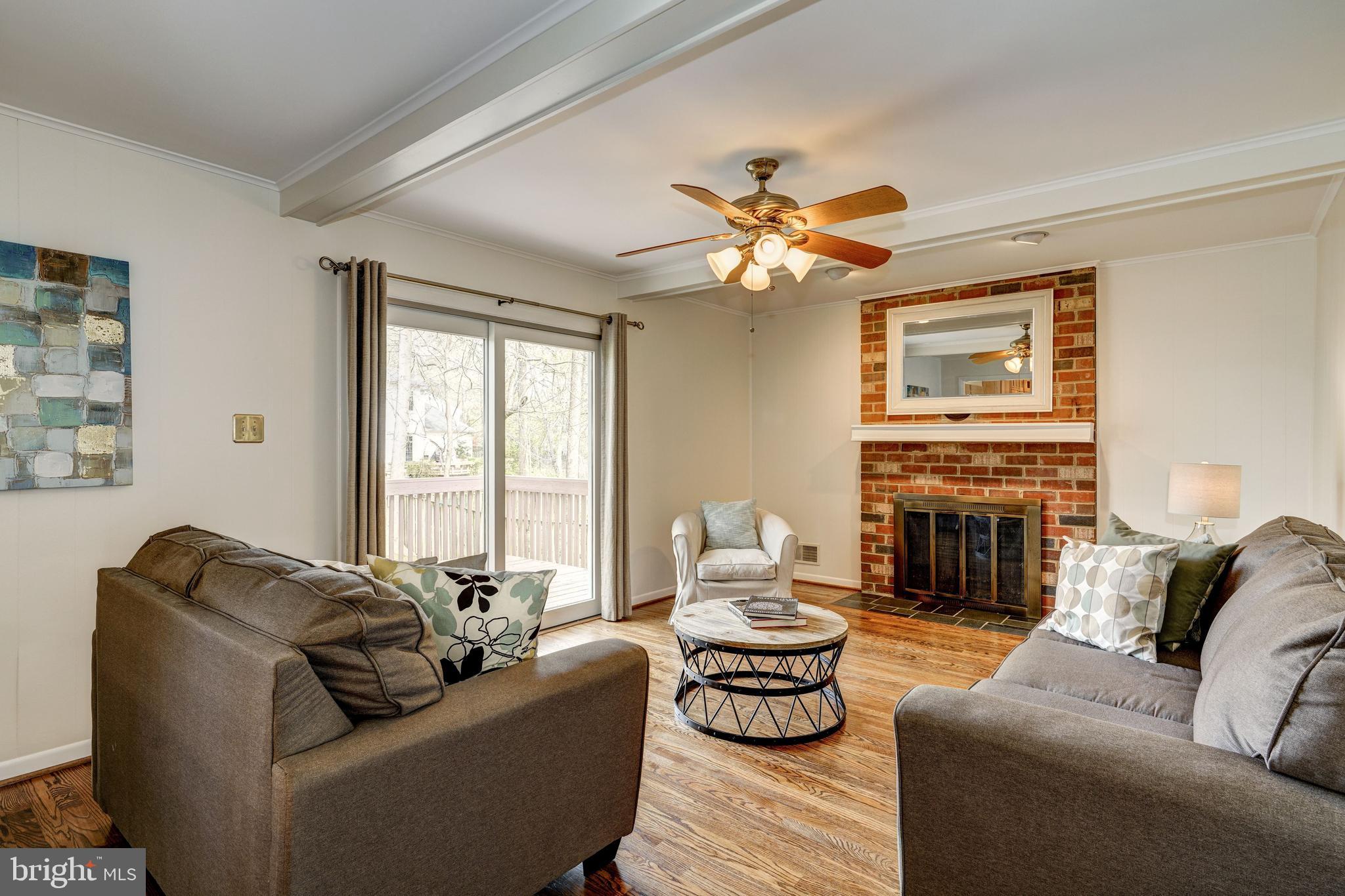 8218 Riverside Road Alexandria, VA 22308 - Photo 9 of 21 Spacious family room w/ fireplace