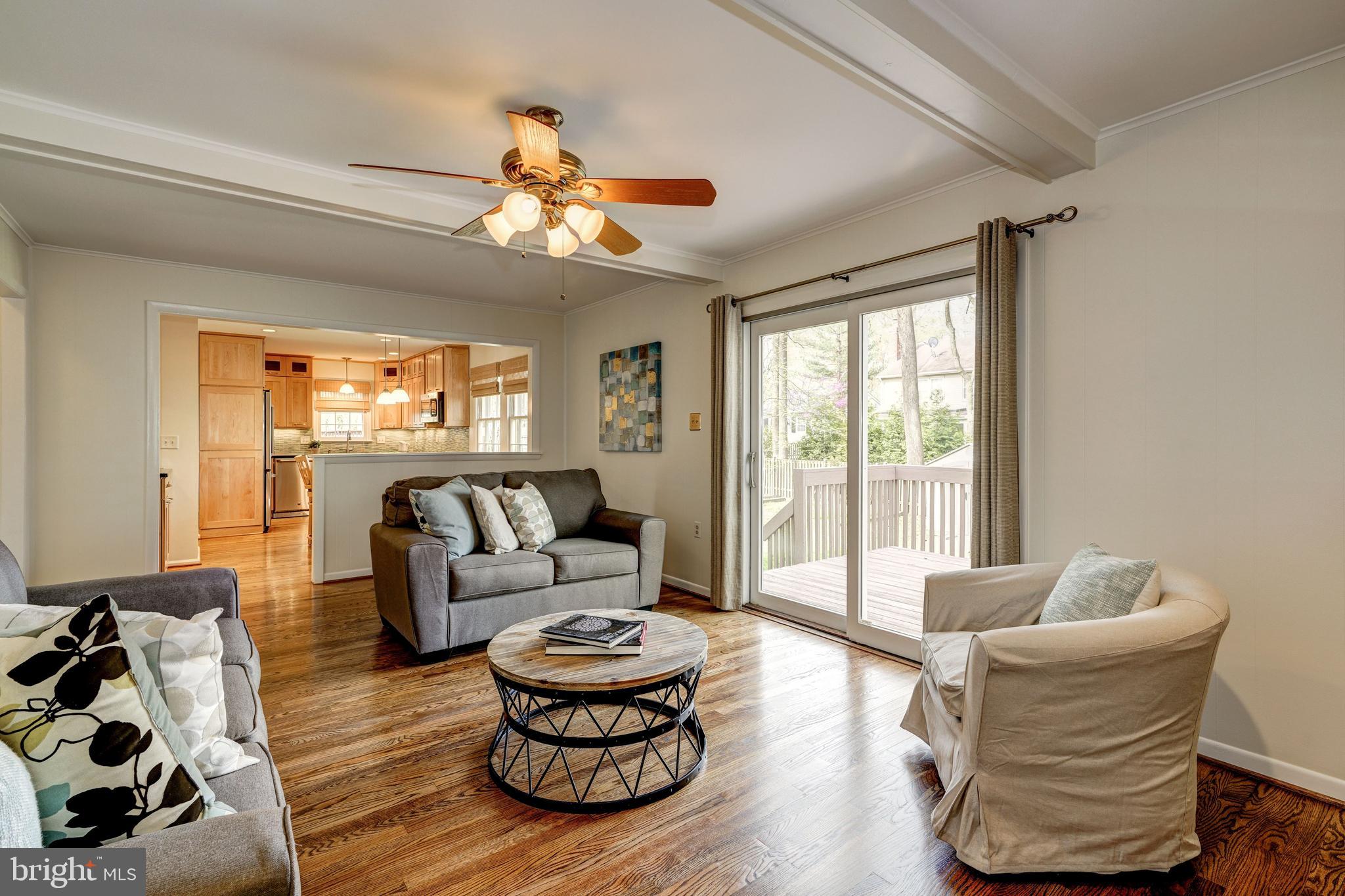 8218 Riverside Road Alexandria, VA 22308 - Photo 10 of 21 Family room opens to deck