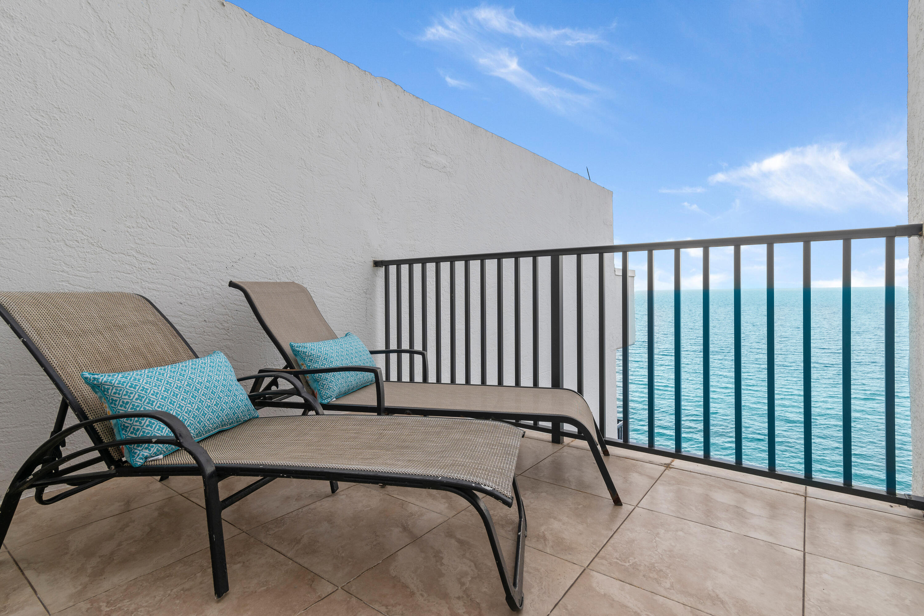 4100 East County Highway 30A, Unit 1805 Santa Rosa Beach, FL 32459 - Photo 19 of 35 a balcony with table and chairs