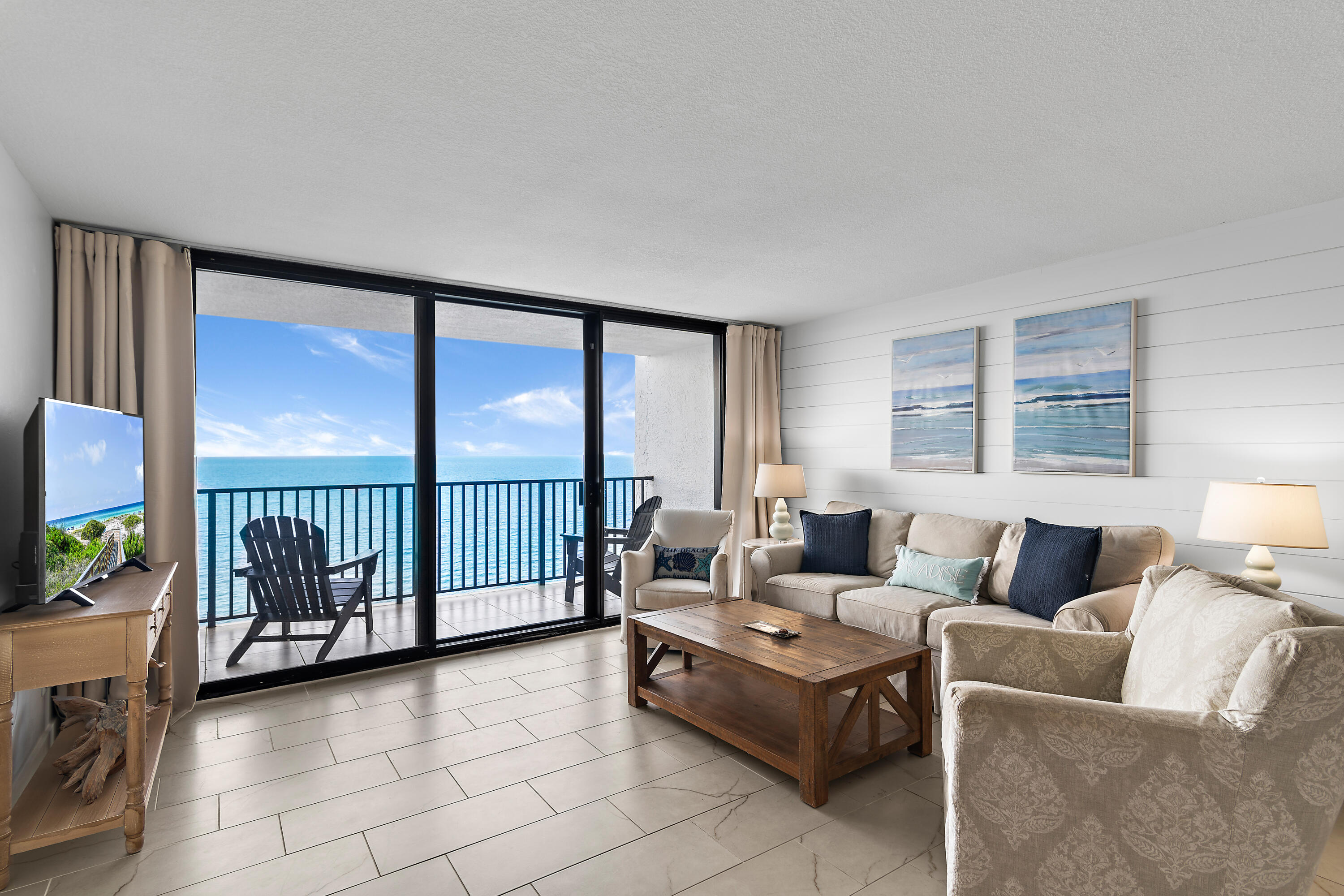 4100 East County Highway 30A, Unit 1805 Santa Rosa Beach, FL 32459 - Photo 2 of 35 a living room with furniture and large windows