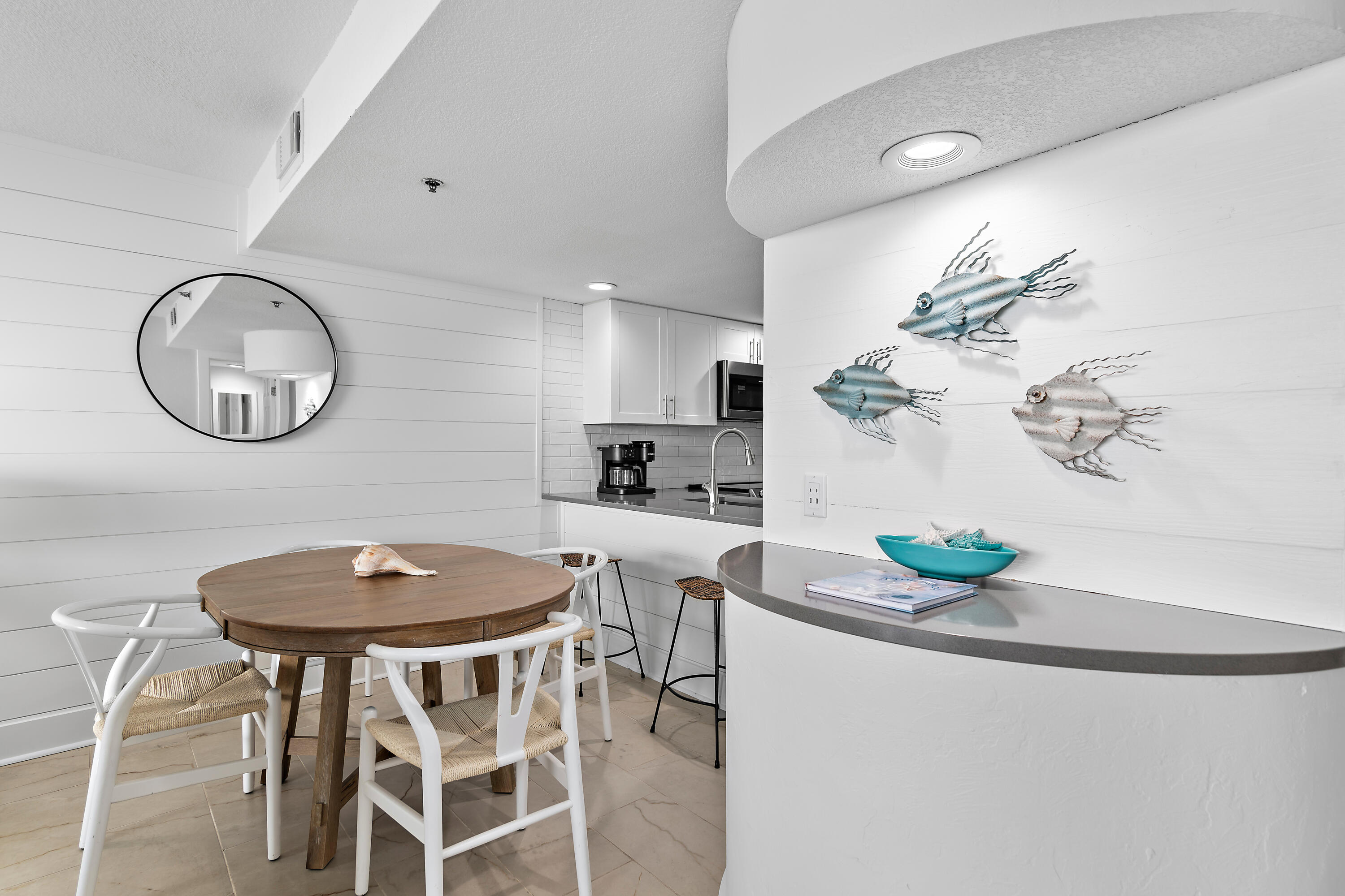 4100 East County Highway 30A, Unit 1805 Santa Rosa Beach, FL 32459 - Photo 7 of 35 a dining room with furniture and wooden floor