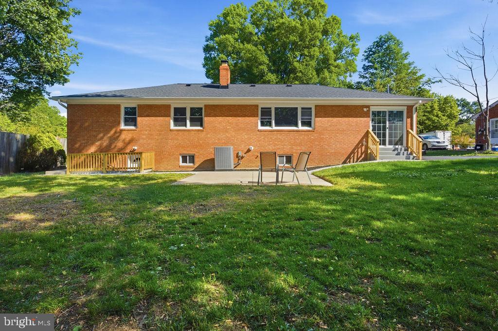 6620 Napoli Road Temple Hills, MD 20748 - Photo 37 of 38 a view of a house with a yard and sitting area