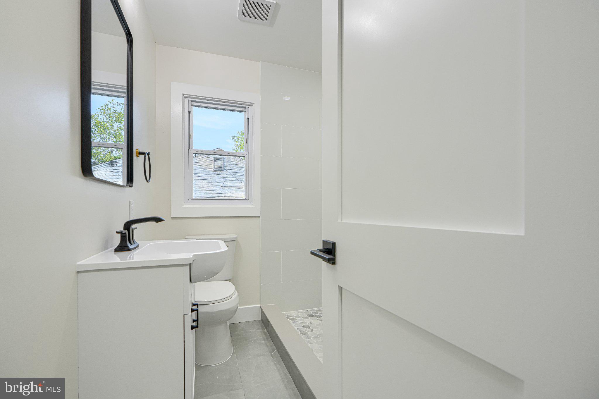 103 Stoneleigh Road Bel Air, MD 21014 - Photo 33 of 45 Modern bathroom with natural light.