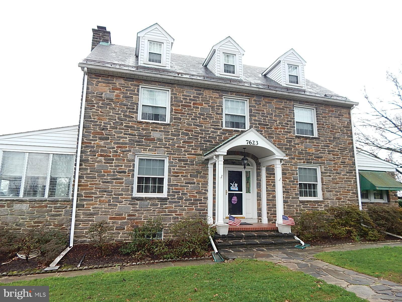 7623 Philadelphia Road Baltimore, MD 21237 - Photo 1 of 28 a front view of a house with garden