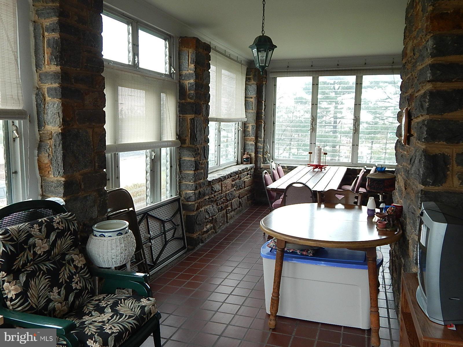 7623 Philadelphia Road Baltimore, MD 21237 - Photo 24 of 28 a very nice looking living room with a large window and furniture