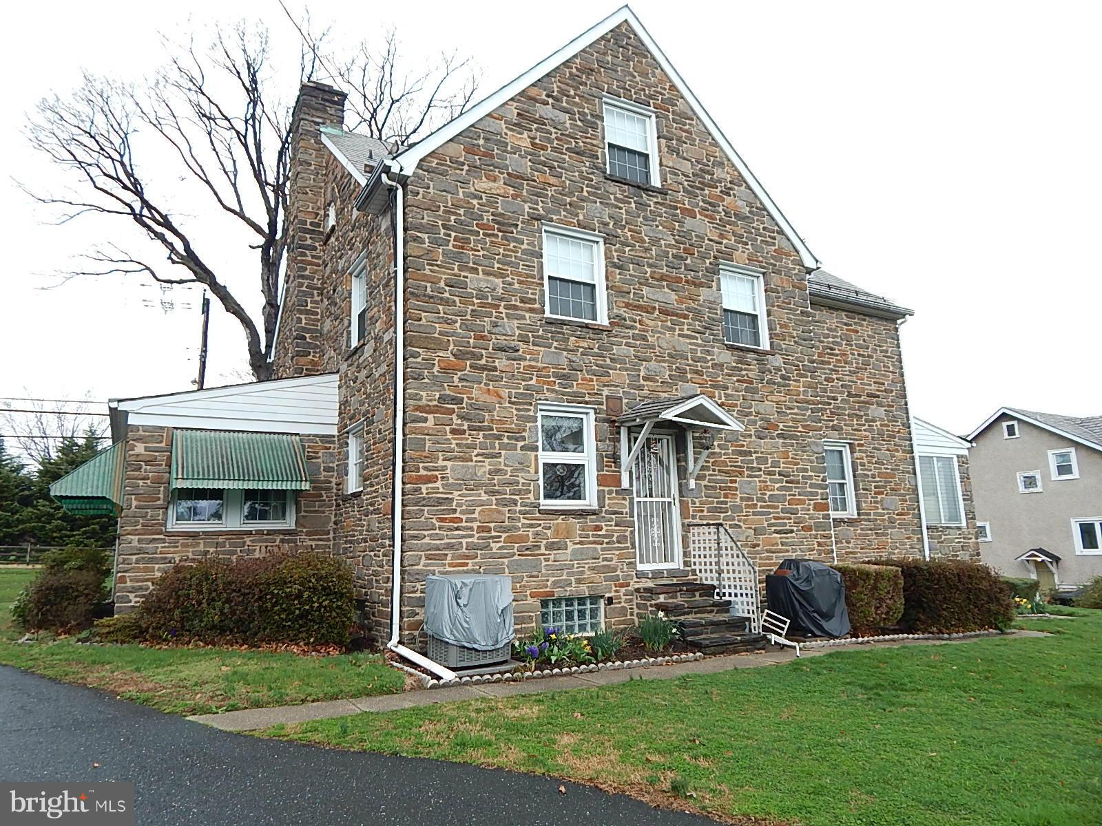 7623 Philadelphia Road Baltimore, MD 21237 - Photo 26 of 28 a front view of a house with a yard