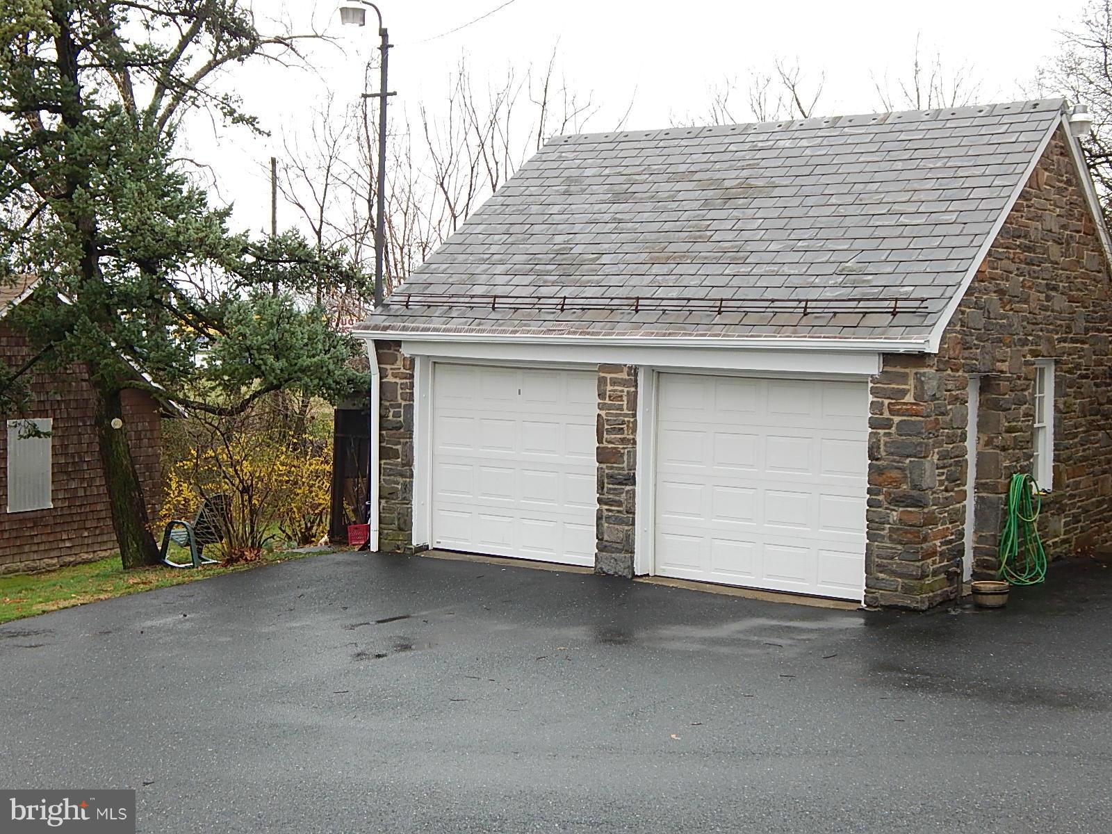 7623 Philadelphia Road Baltimore, MD 21237 - Photo 27 of 28 a view of a house with a garage