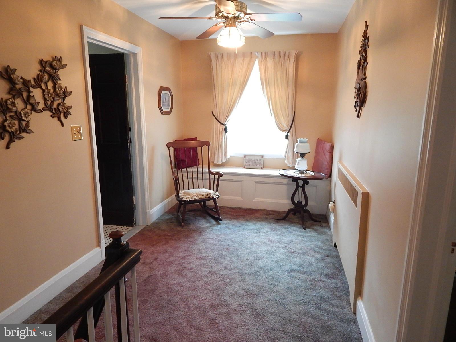 7623 Philadelphia Road Baltimore, MD 21237 - Photo 9 of 28 a living room with furniture and a window