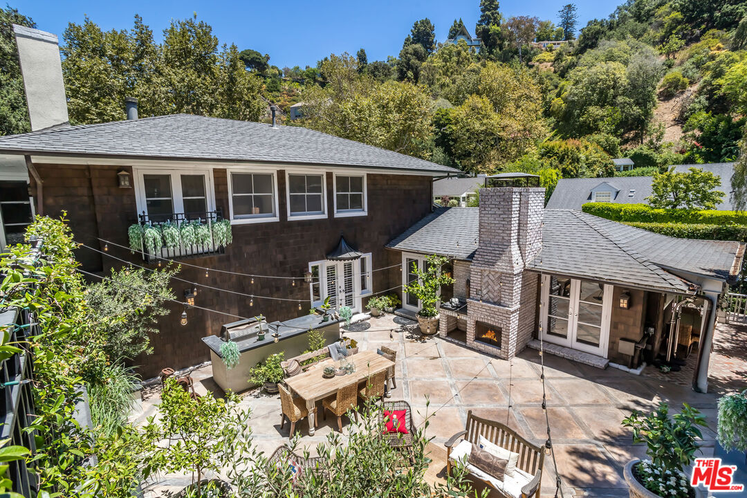 919 Chantilly Road Los Angeles, CA 90077 - Photo 23 of 23 an aerial view of a house with yard and sitting area
