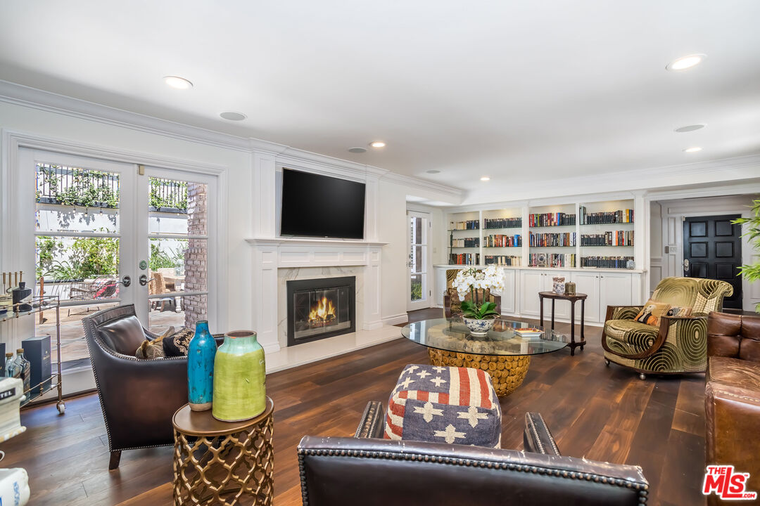 919 Chantilly Road Los Angeles, CA 90077 - Photo 7 of 23 a living room with furniture or fireplace and a large window