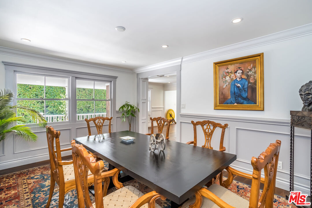 919 Chantilly Road Los Angeles, CA 90077 - Photo 9 of 23 a view of a dining room with furniture window and outside view