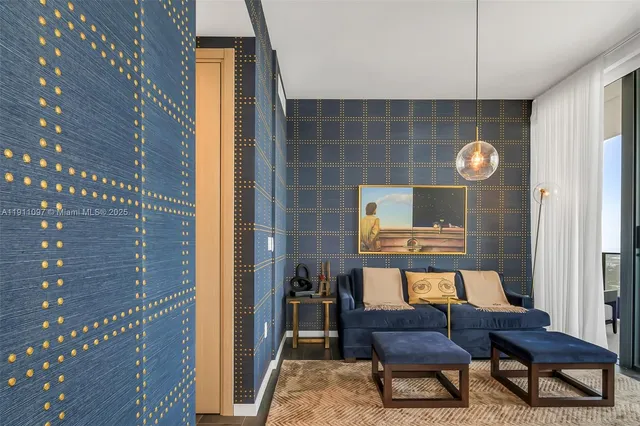 a view of a door and chair in the back yard of the house