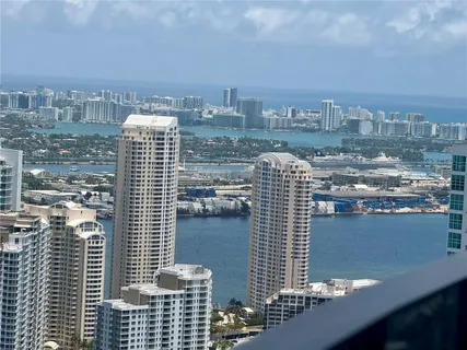 a view of a city with tall buildings