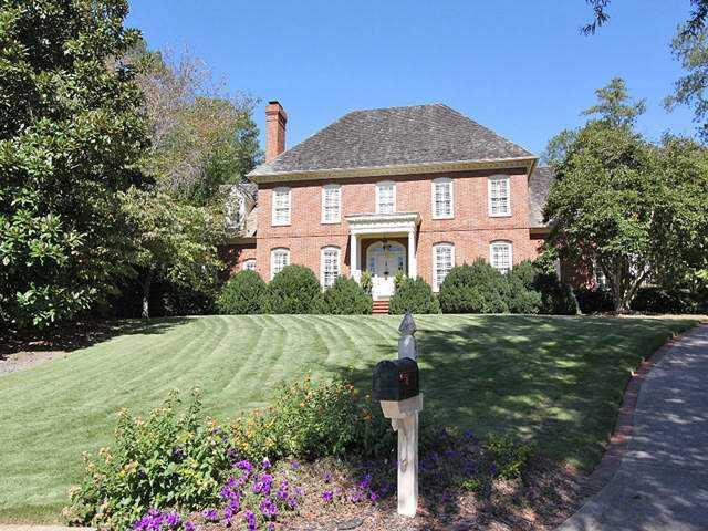 Exterior Front. Gorgeous brick Traditional in prestigious Old Stratton Chase, sitting beautifully in the first cul-de-sac.