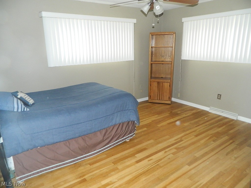34505 Pettibone Road Solon, OH 44139 - Photo 13 of 32 Master Bedroom with Hardwood Flooring, Ceiling Fan ...