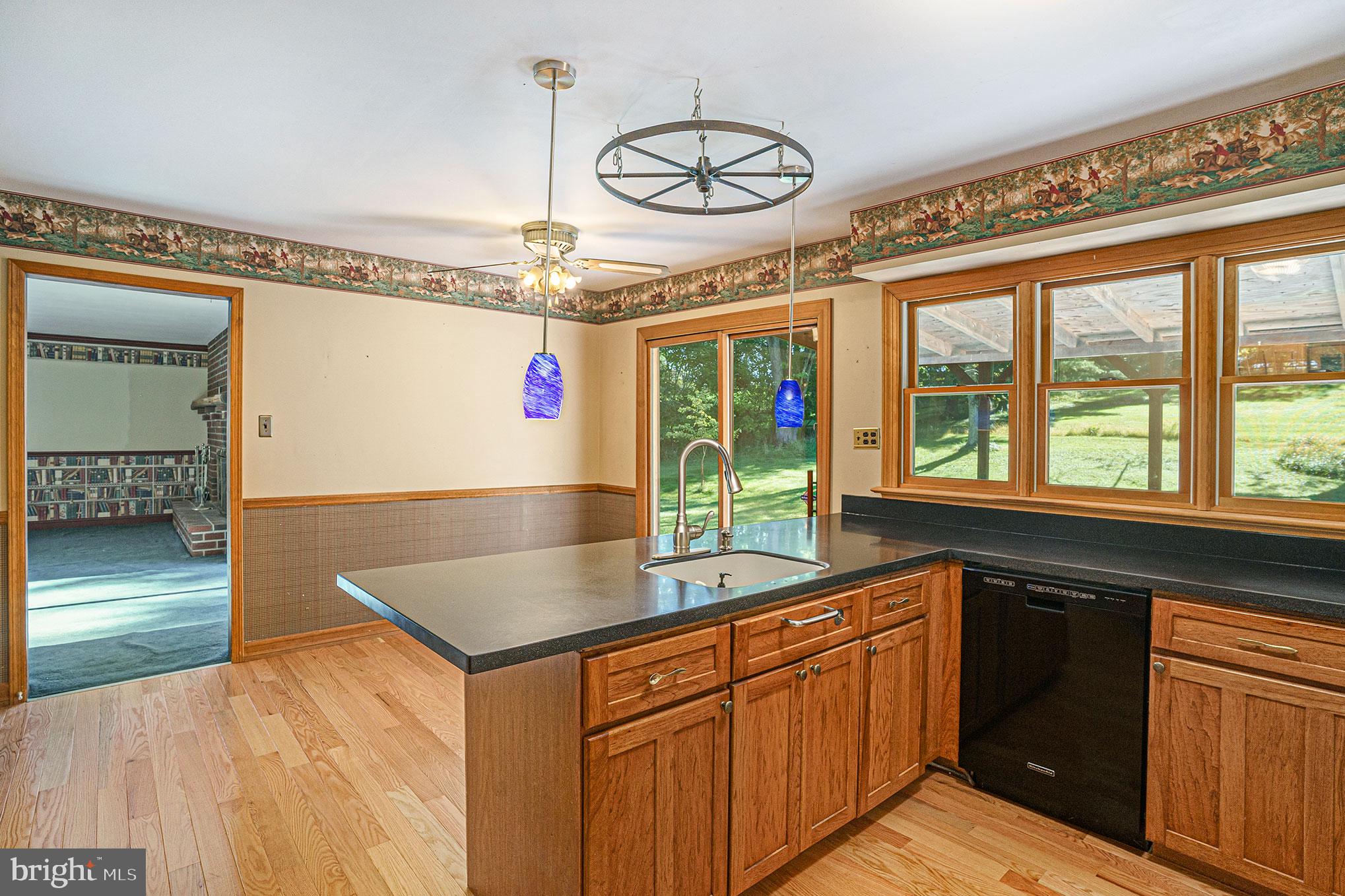 604 Quarry Road Harleysville, PA 19438 - Photo 17 of 44 Kitchen with sliding doors to covered patio