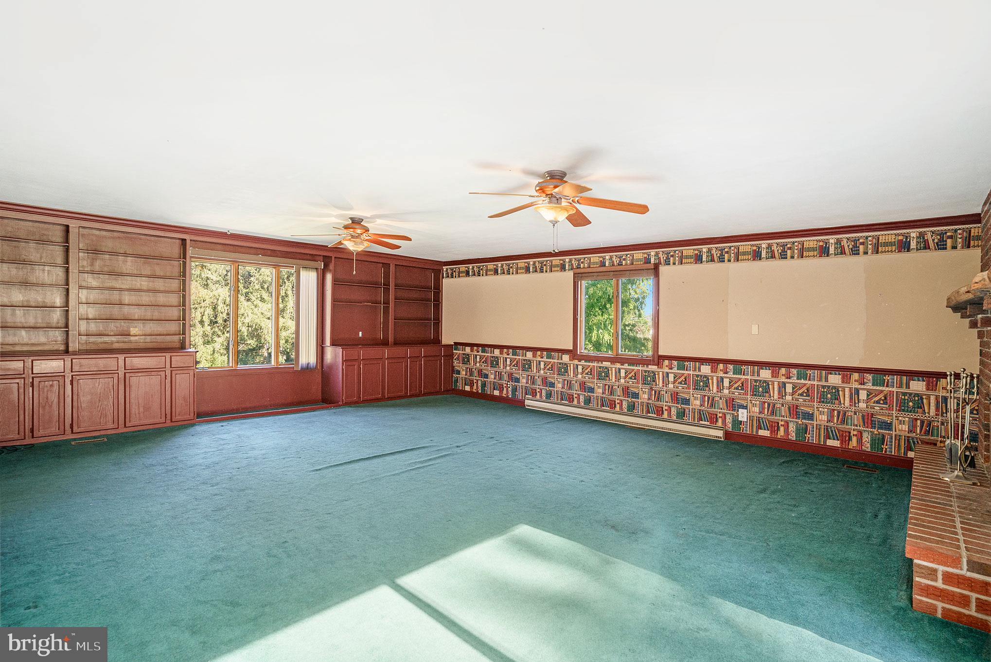 604 Quarry Road Harleysville, PA 19438 - Photo 21 of 44 Huge family room with built-in shelving