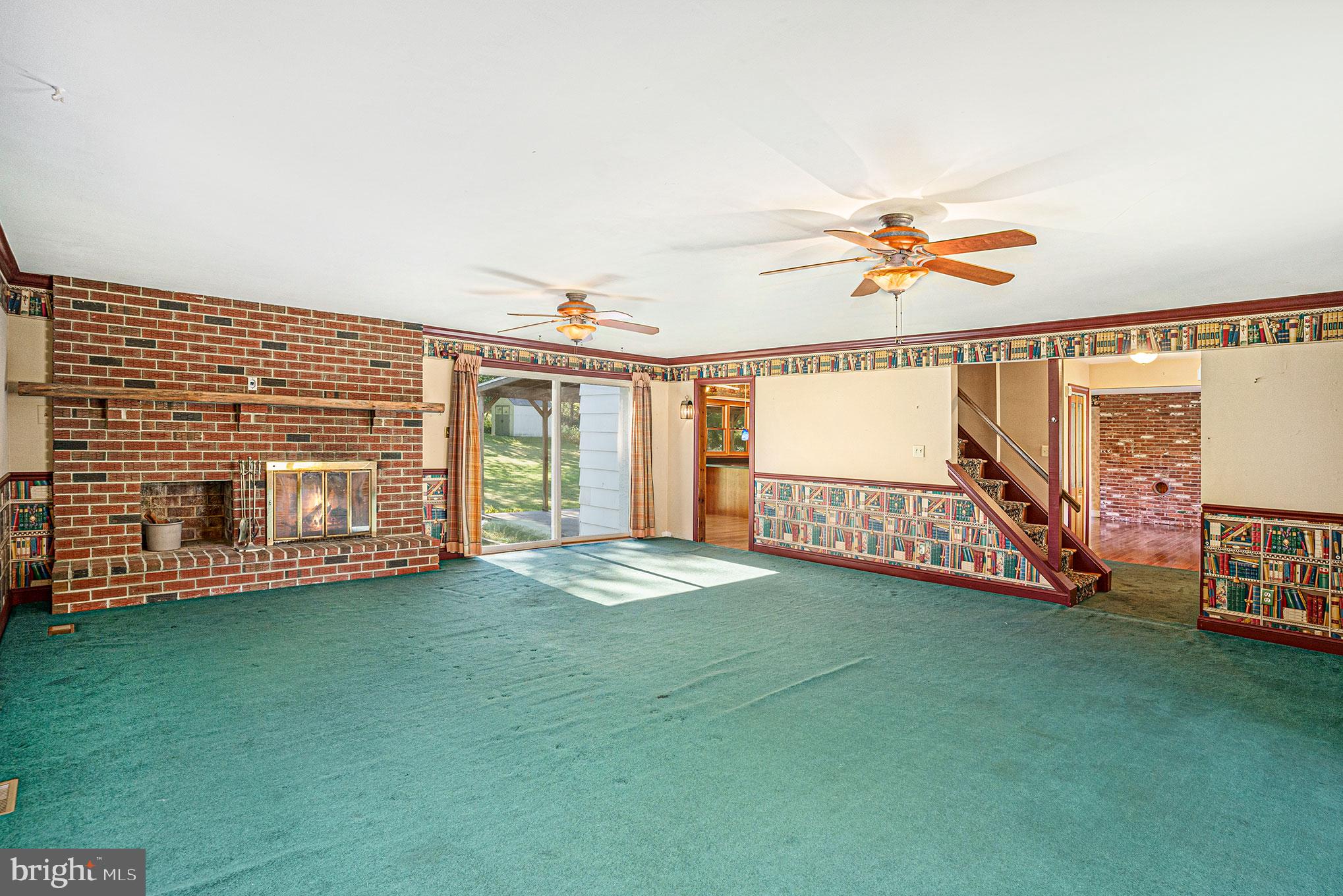 604 Quarry Road Harleysville, PA 19438 - Photo 22 of 44 Huge family room with decorative fireplace.