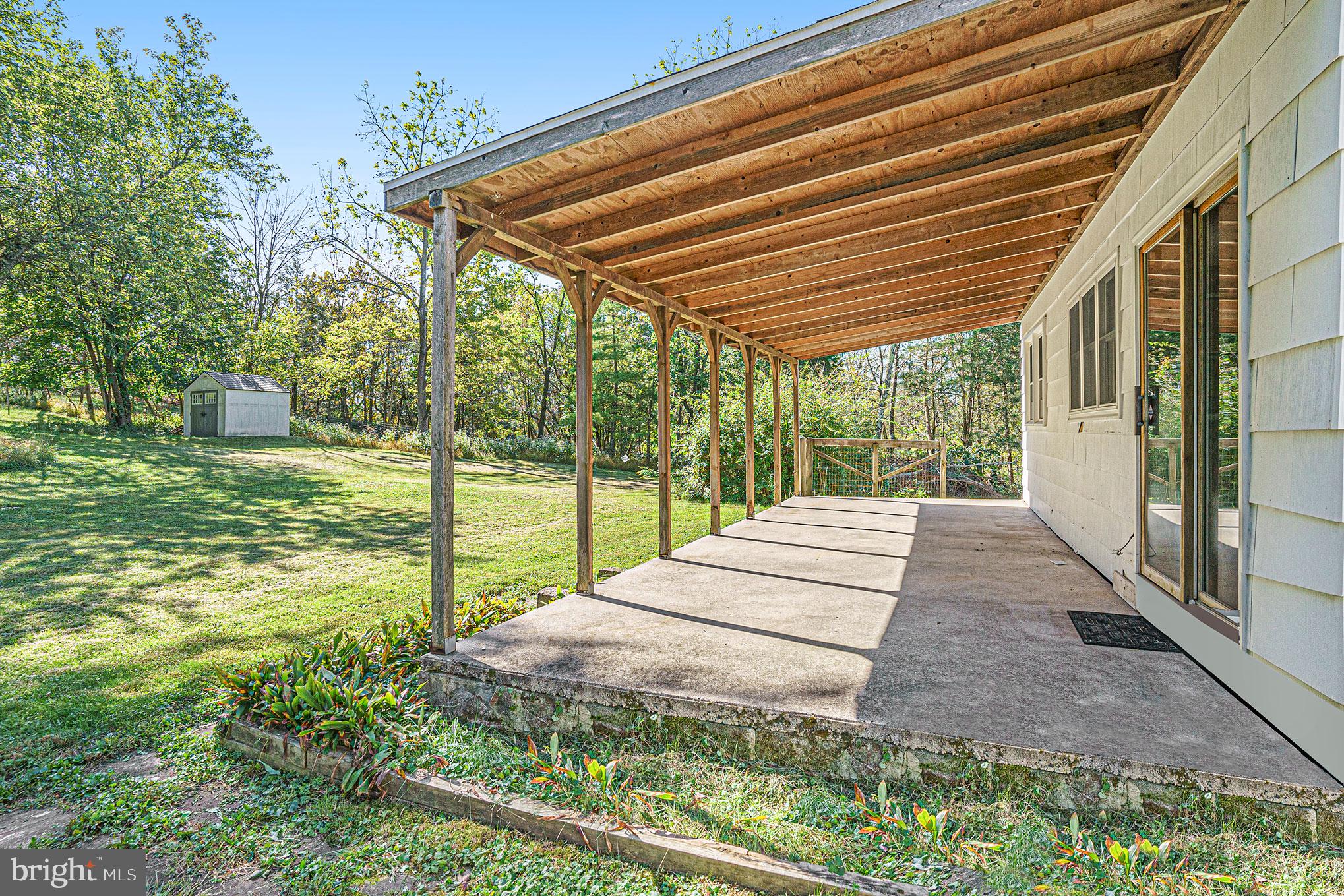 604 Quarry Road Harleysville, PA 19438 - Photo 34 of 44 Covered Patio side view