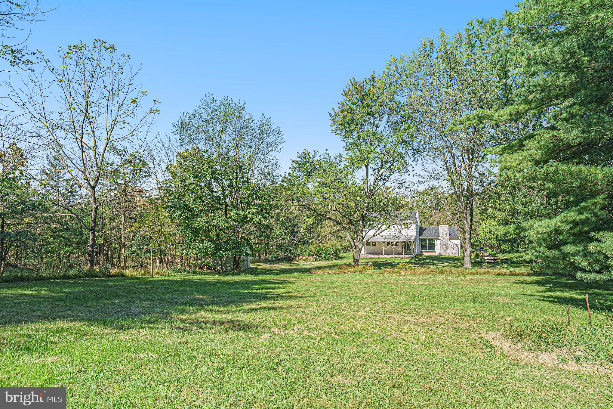 604 Quarry Road Harleysville, PA 19438 - Photo 39 of 44 Rear yard from tree line towards home