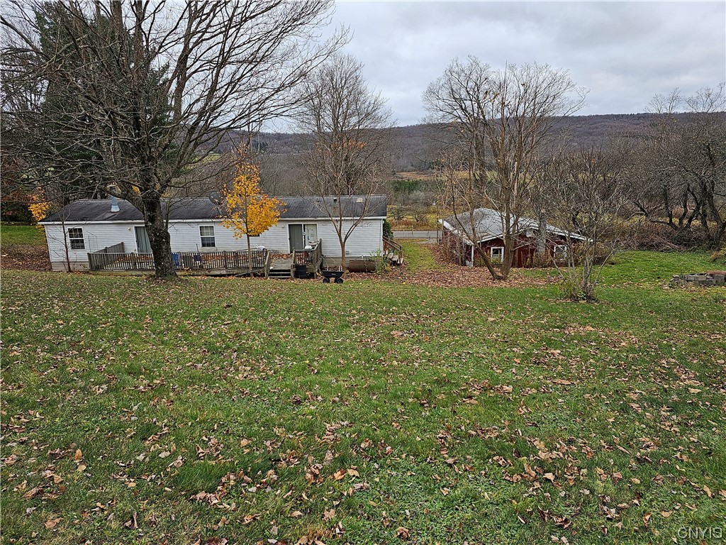 3672 Clinton St Extension Solon, NY 13101 - Photo 1 of 1 Top of the backyard looking down on the house and