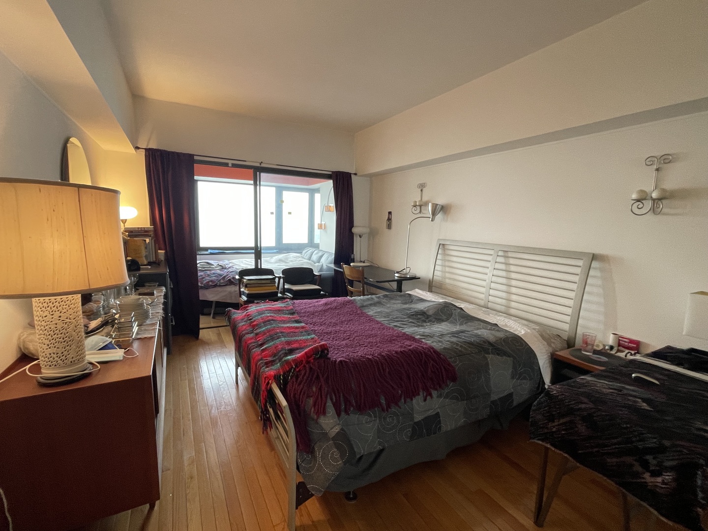 175 East Delaware Place, Unit 5604 Chicago, IL 60611 - Photo 11 of 21 a bedroom with a bed and window