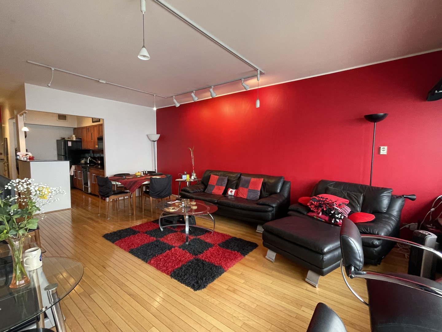 175 East Delaware Place, Unit 5604 Chicago, IL 60611 - Photo 7 of 21 a living room with furniture a rug and a flat screen tv