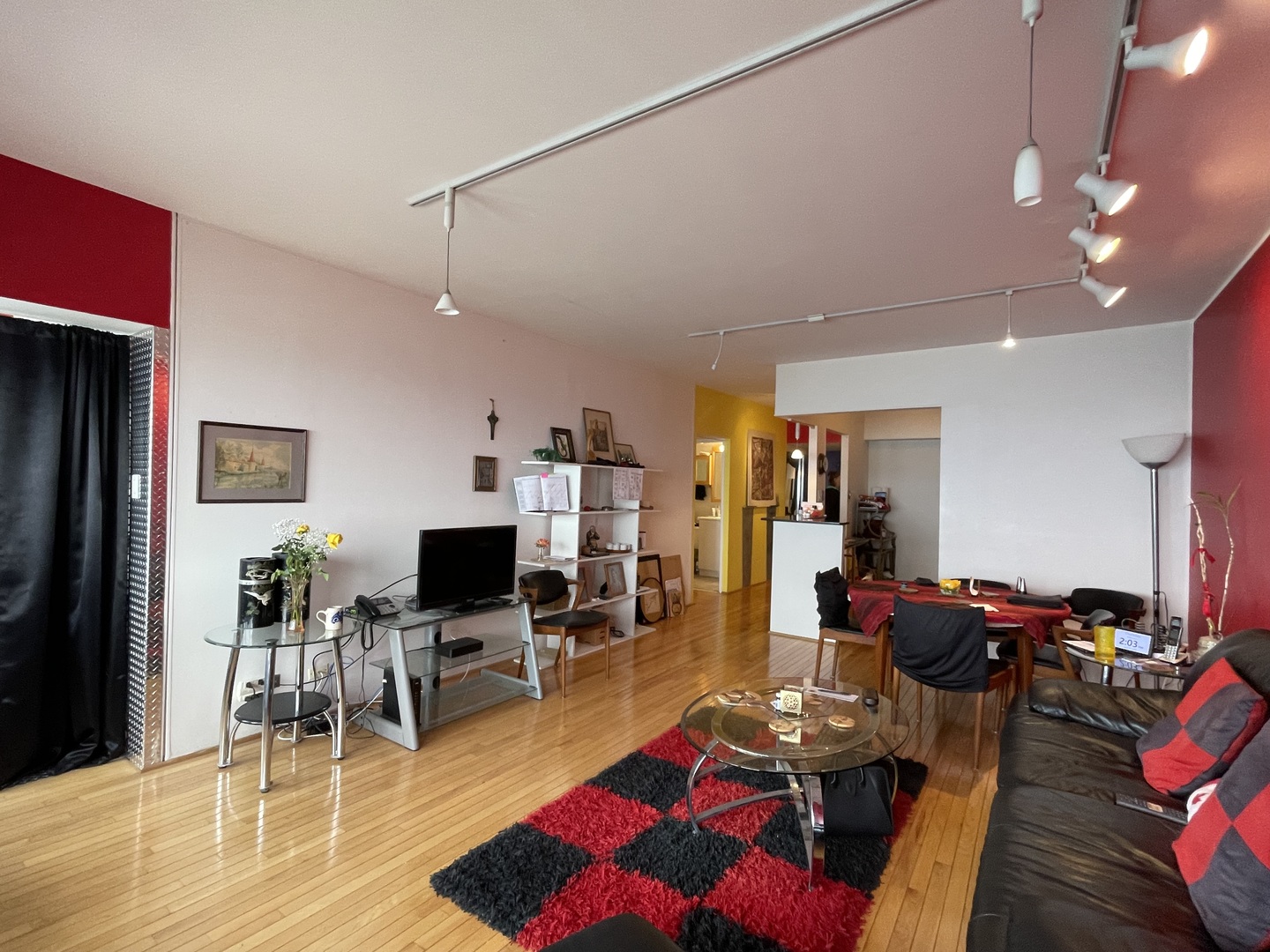 175 East Delaware Place, Unit 5604 Chicago, IL 60611 - Photo 8 of 21 a living room with furniture and a flat screen tv