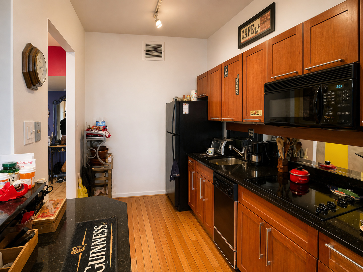 175 East Delaware Place, Unit 5604 Chicago, IL 60611 - Photo 9 of 21 a kitchen with sink and cabinets
