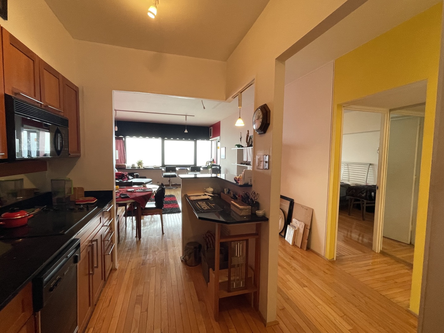 175 East Delaware Place, Unit 5604 Chicago, IL 60611 - Photo 10 of 21 a view of a dining room with furniture and wooden floor