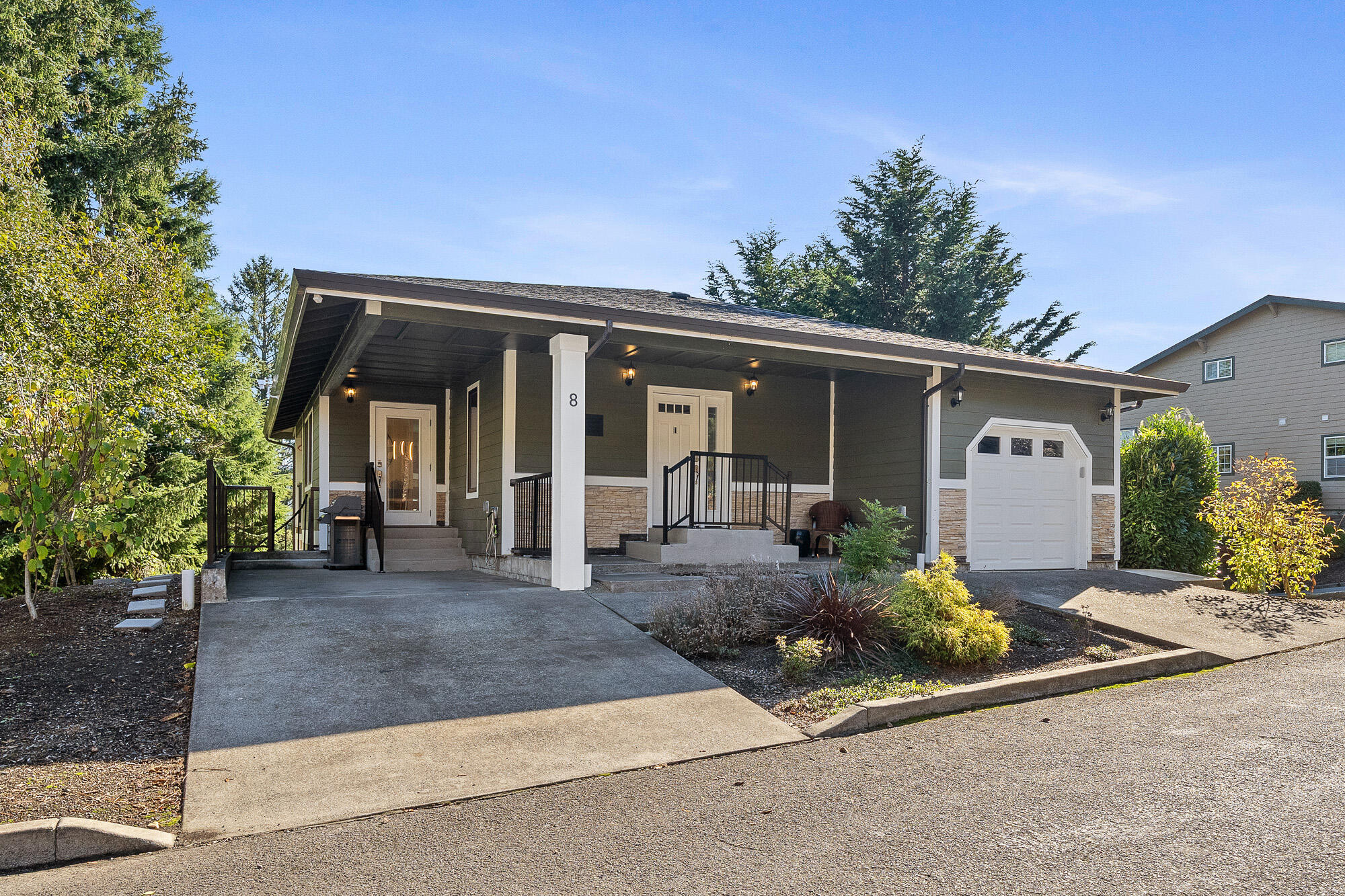 13150 D Street Nehalem, OR 97131 - Photo 26 of 29 a front view of a house with garden