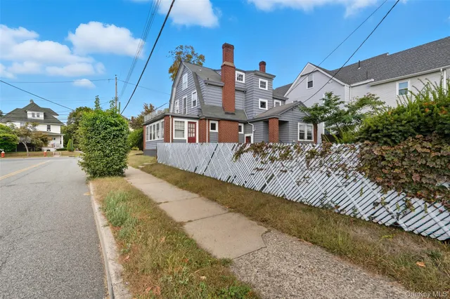 a view of a street with houses