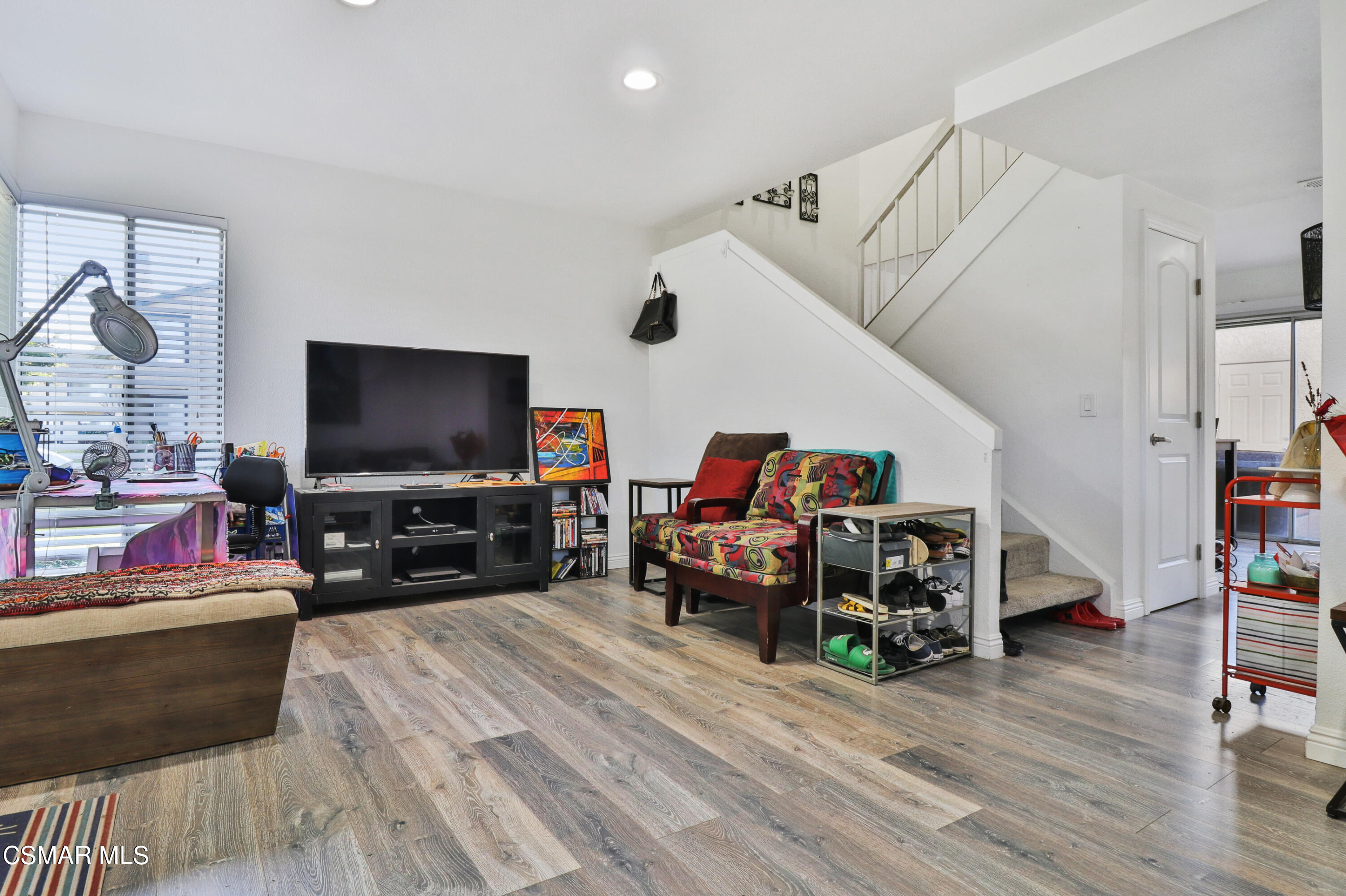 5239 Perkins Road Oxnard, CA 93033 - Photo 2 of 25 a living room with furniture and a flat screen tv