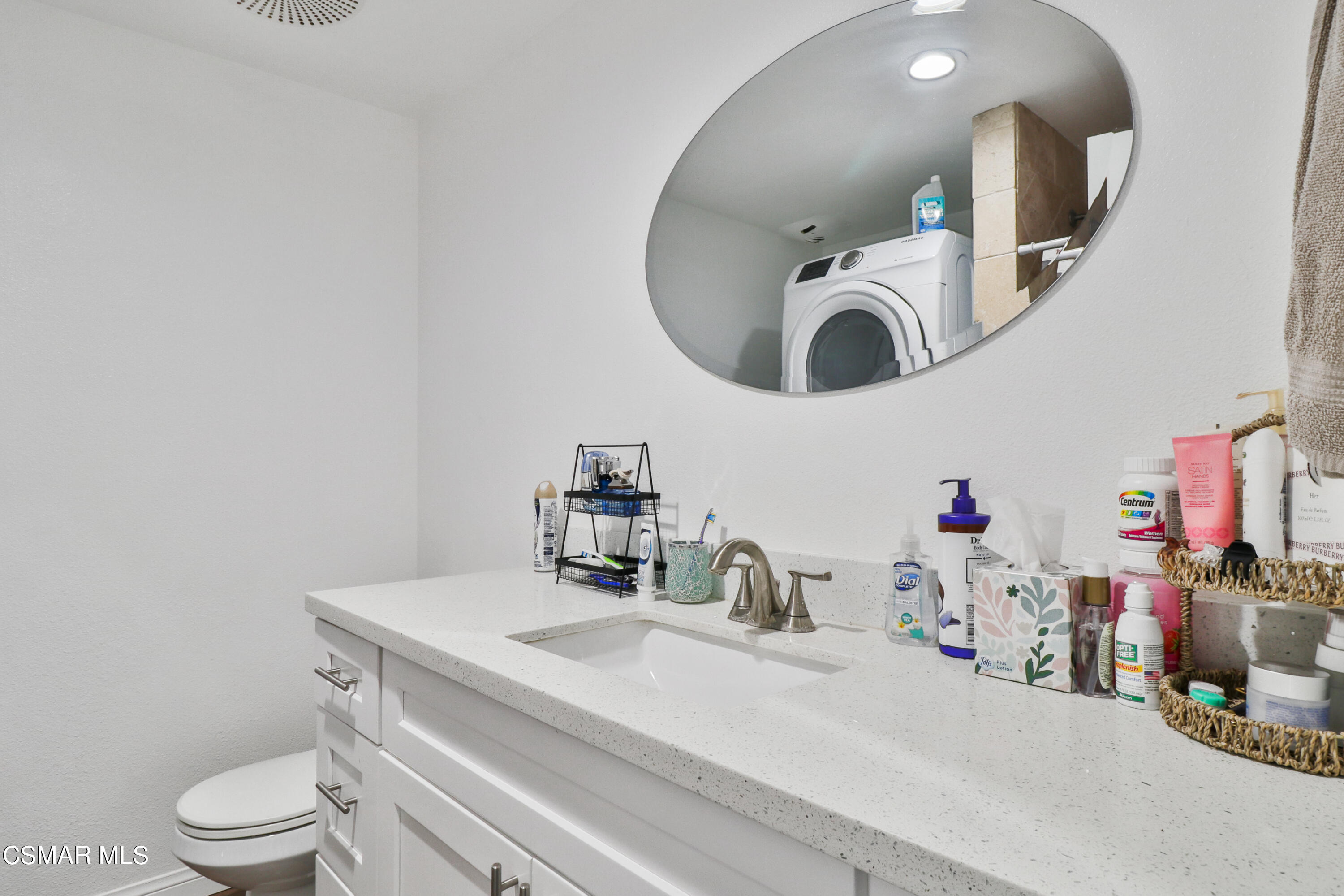 5239 Perkins Road Oxnard, CA 93033 - Photo 18 of 25 a bathroom with a toilet sink and mirror