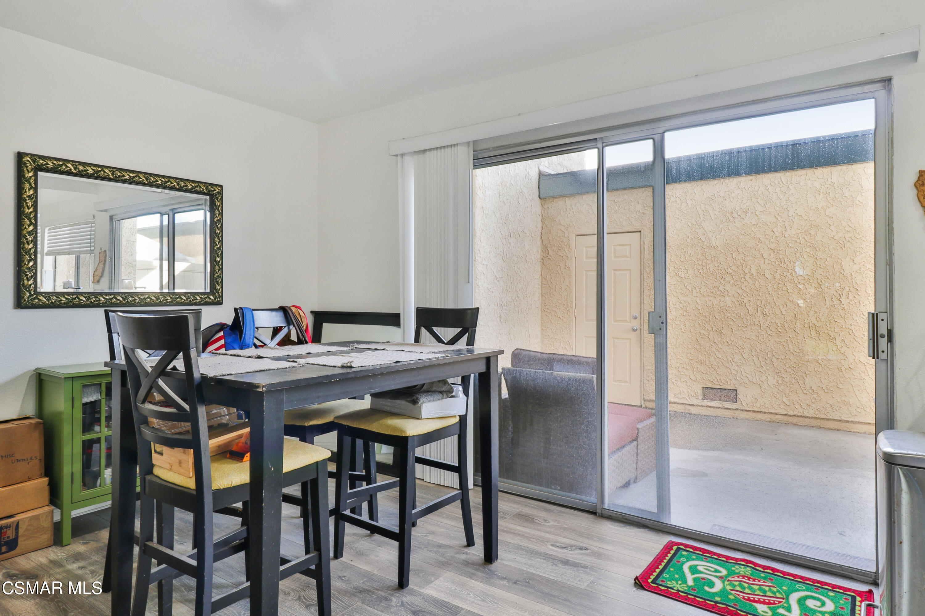5239 Perkins Road Oxnard, CA 93033 - Photo 8 of 25 a view of a dining room with furniture and a window