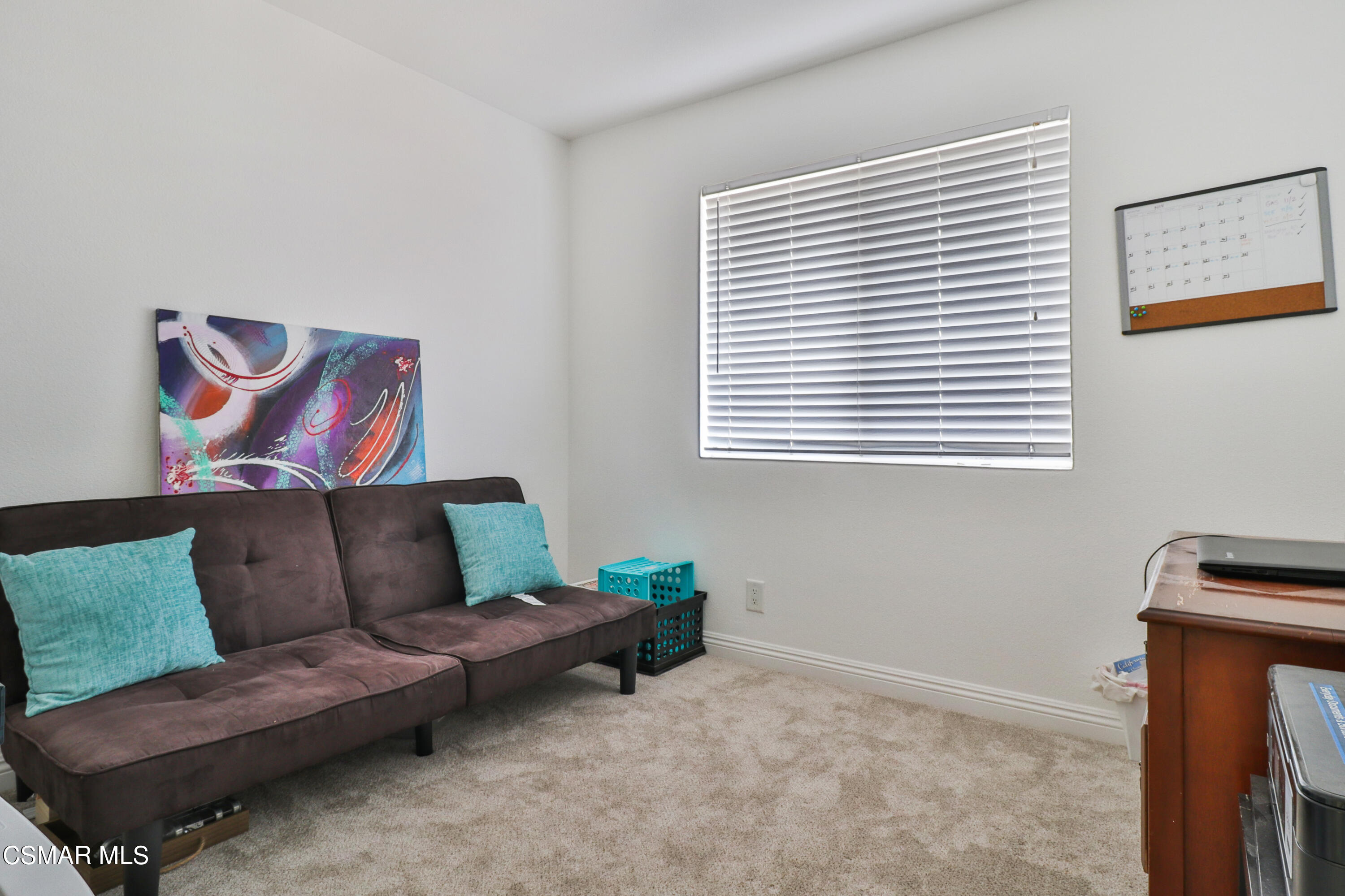 5239 Perkins Road Oxnard, CA 93033 - Photo 9 of 25 a living room with furniture and a window