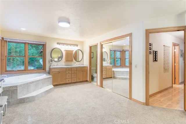 a view of a livingroom with furniture and windows