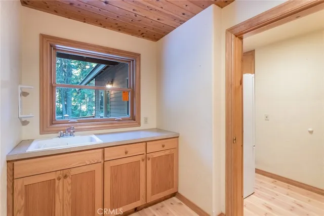 a view of a kitchen that has a sink