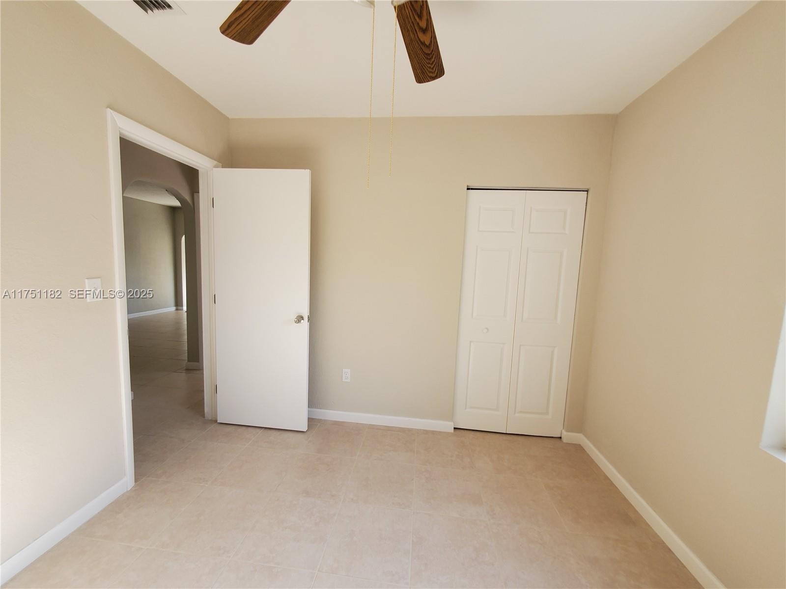 70 Northwest 33rd Street Miami, FL 33127 - Photo 25 of 48 an empty room with a kitchen