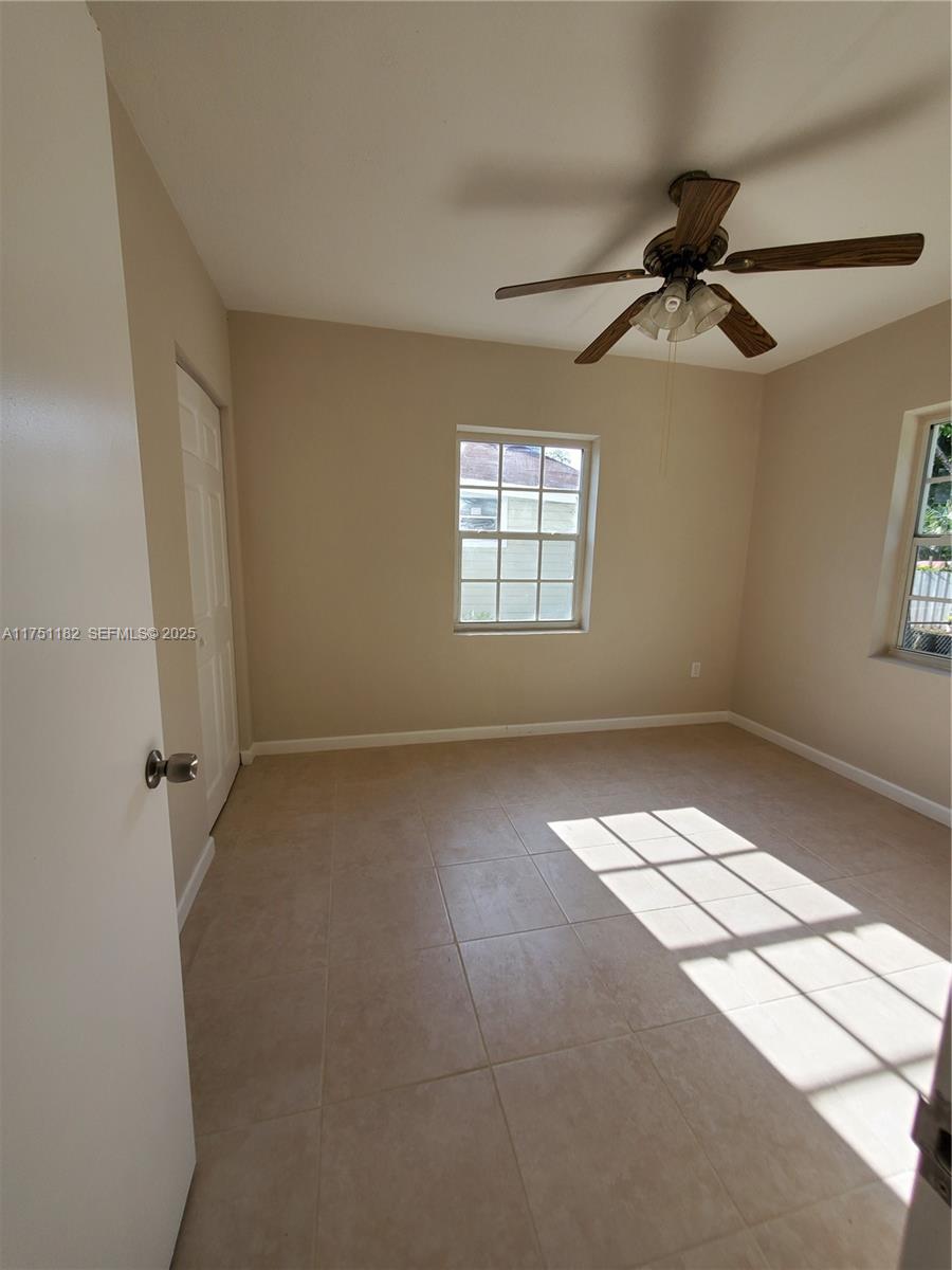 70 Northwest 33rd Street Miami, FL 33127 - Photo 27 of 48 a view of an empty room with a window