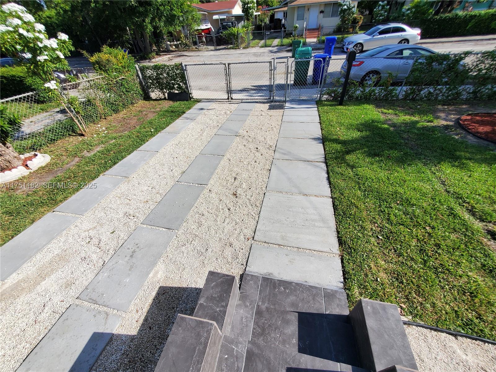 70 Northwest 33rd Street Miami, FL 33127 - Photo 3 of 48 a view of a backyard