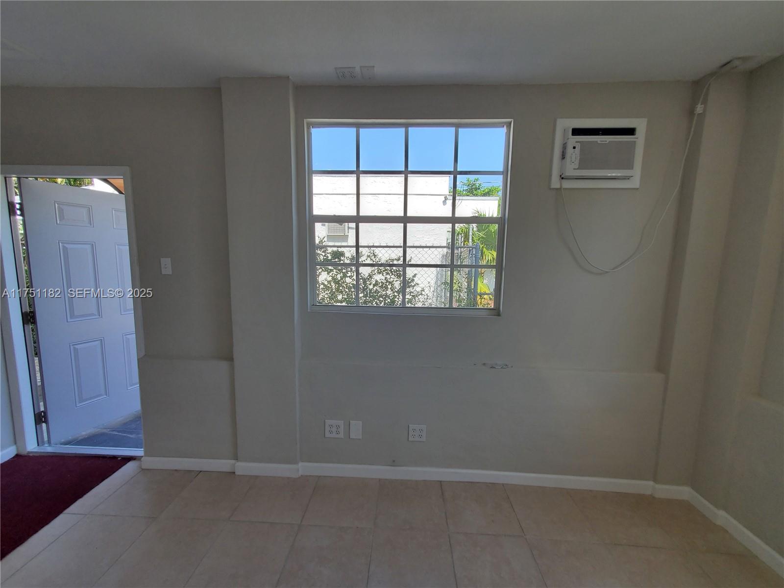 70 Northwest 33rd Street Miami, FL 33127 - Photo 36 of 48 an empty room with windows