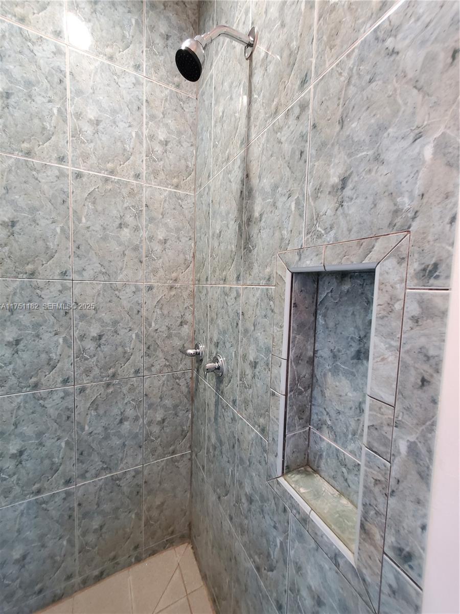 70 Northwest 33rd Street Miami, FL 33127 - Photo 38 of 48 a bathroom with a shower