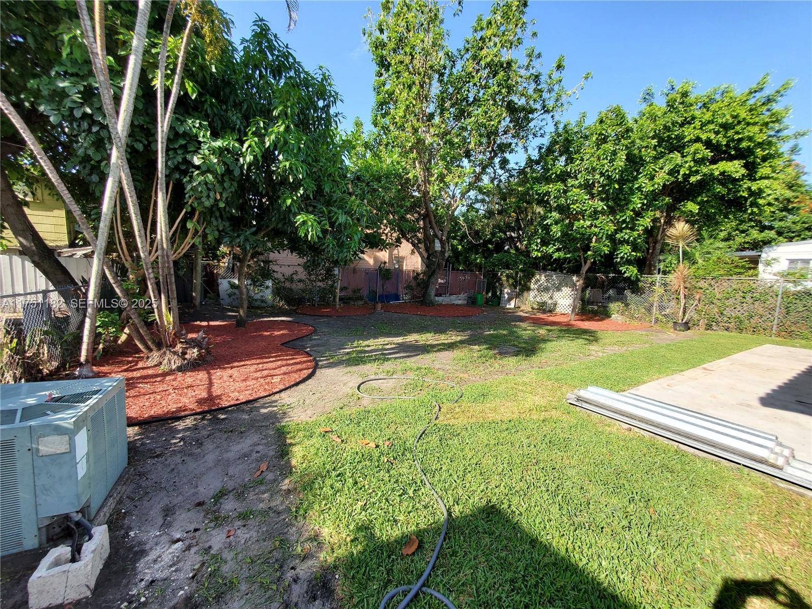 70 Northwest 33rd Street Miami, FL 33127 - Photo 47 of 48 a view of a backyard with swimming pool