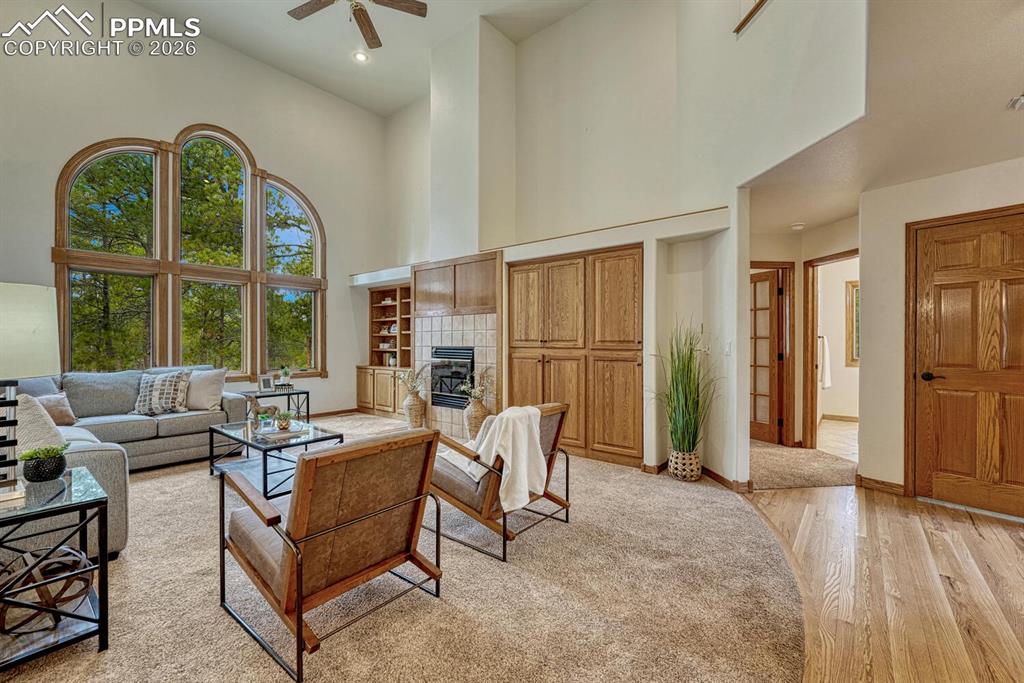 15430 Bar X Road Colorado Springs, CO 80908 - Photo 14 of 50 a living room with furniture and a large window
