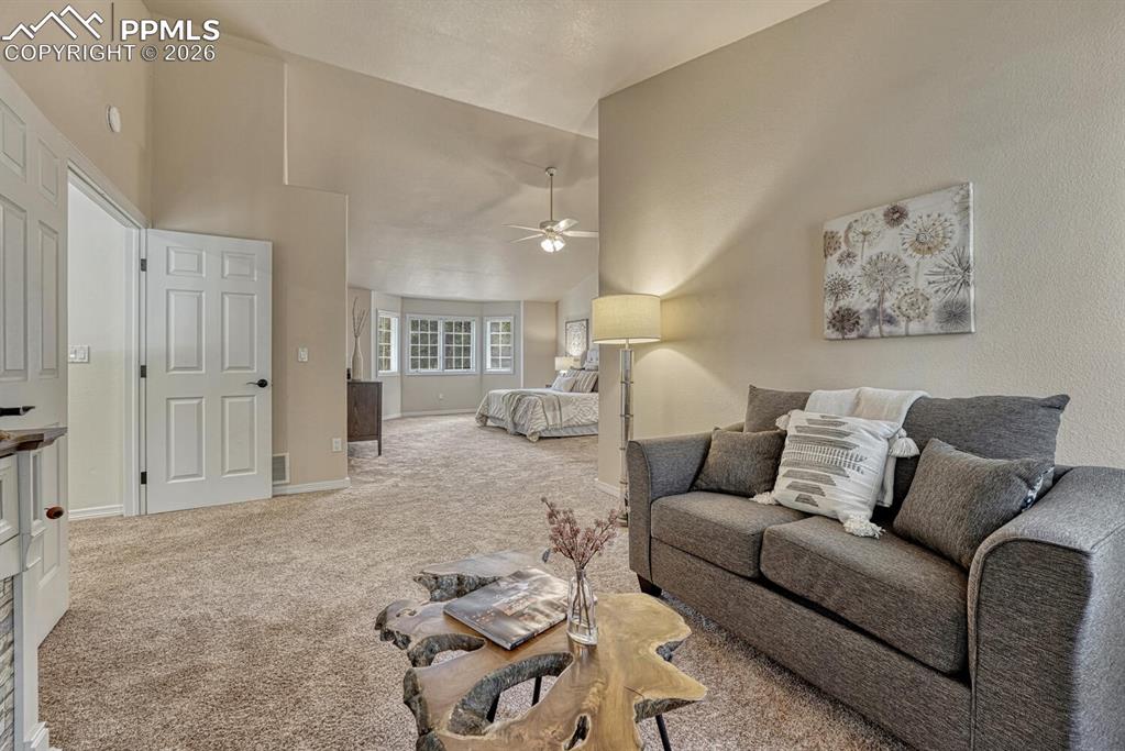 15430 Bar X Road Colorado Springs, CO 80908 - Photo 30 of 50 a living room with furniture