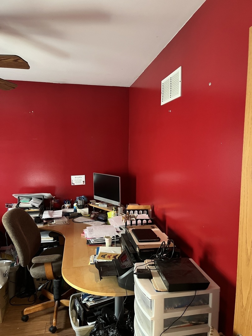 142 Sedgewicke Drive Romeoville, IL 60446 - Photo 8 of 18 a view of a workspace with furniture