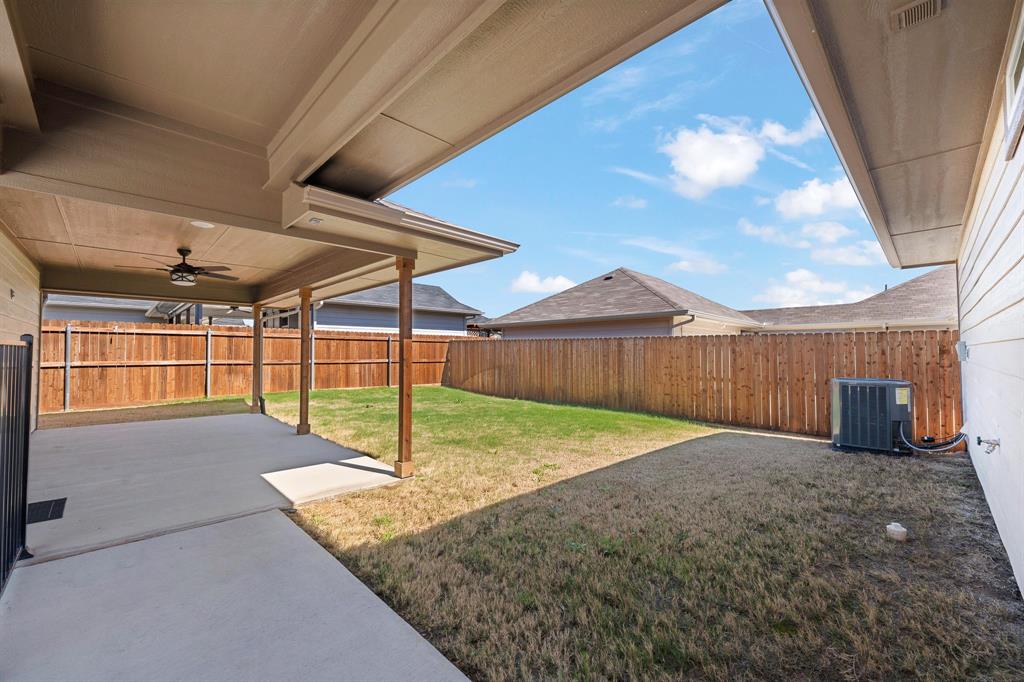 1568 Reverie Road Burleson, TX 76028 - Photo 24 of 26 a view of a backyard